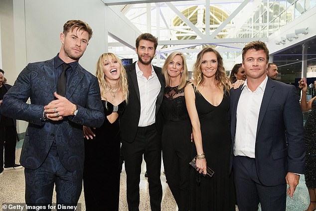 The hottest family in Hollywood! Chris Hemsworth posed alongside (L-R) Miley Cyrus, brother Liam, mother Leonie, sister-in-law Samantha and older brother Luke on Monday night in LA