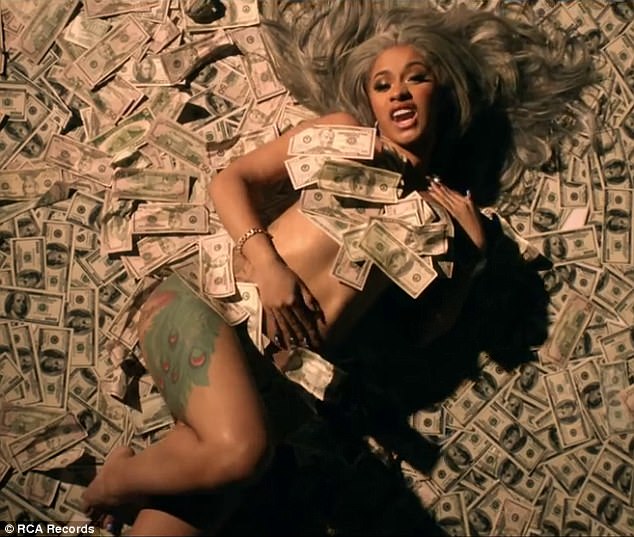 Making money moves: She was just featured in the music video for No Limit with G-Eazy and ASAP Rocky where she is featured rolling around naked in a pile of money in the clip which was released on Wednesday