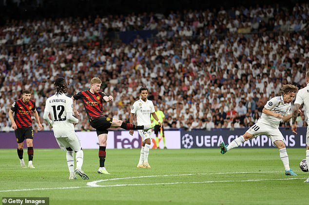 Score: During the tense semi-final first-leg, Real Madrid's Vinicius Junior scored the first goal with a magnificent strike, before Kevin De Bruyne (pictured) made an equaliser