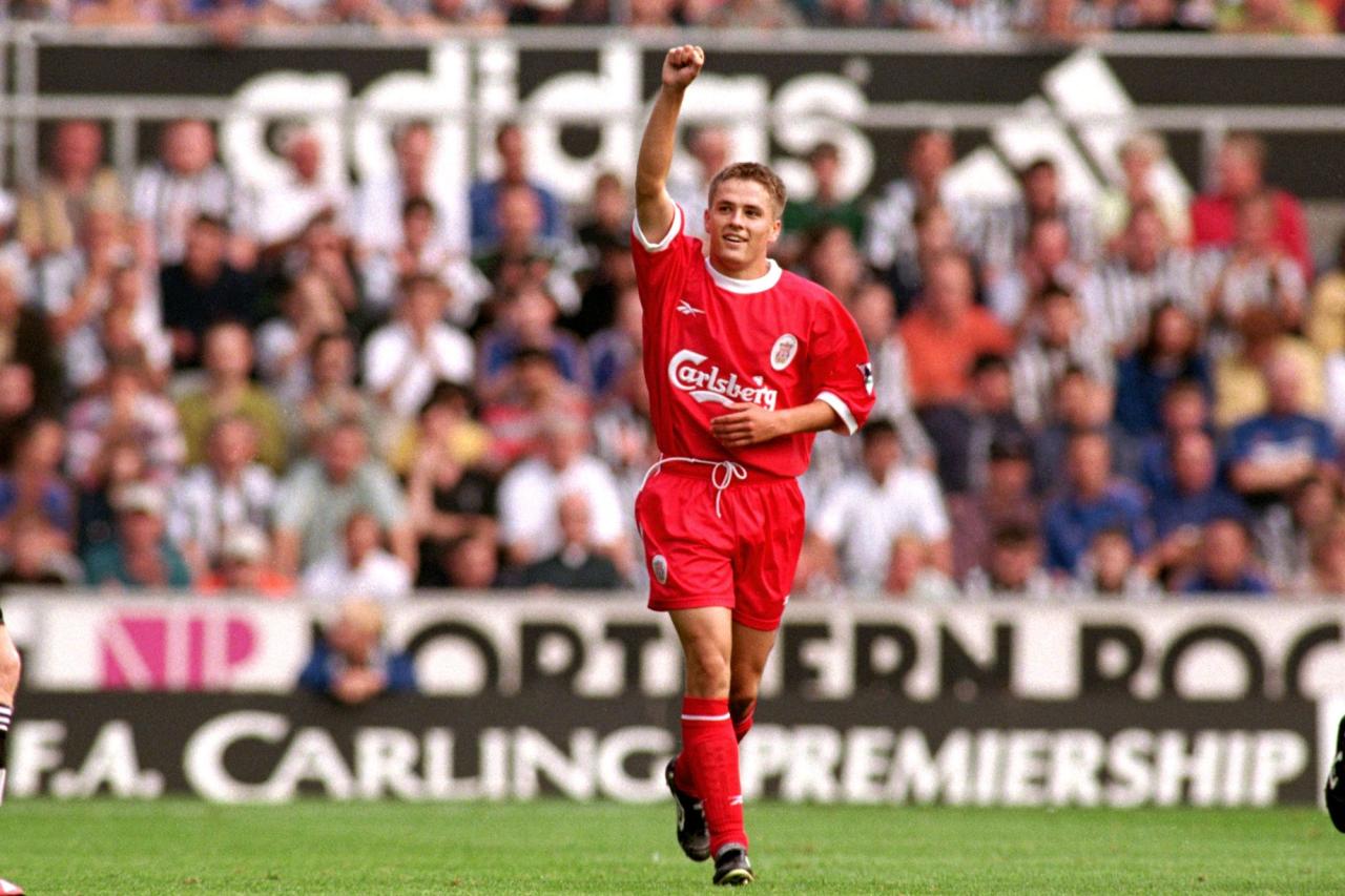 Liverpool's Michael Owen celebrates scoring his hat-trick against Newcastle