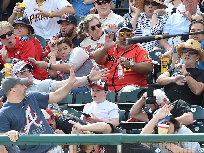 Father saves son from baseball bat sent flying into the crowd at Pittsburgh  Pirates game: Photos | news.com.au — Australia's leading news site