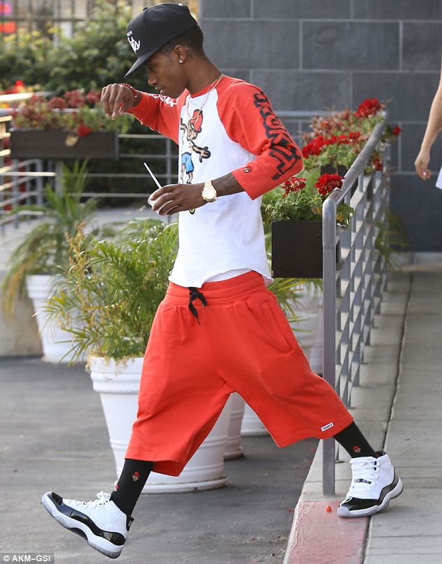 Baggy: The rapper wore a pair of very low-slung shorts and a matching T-shirt