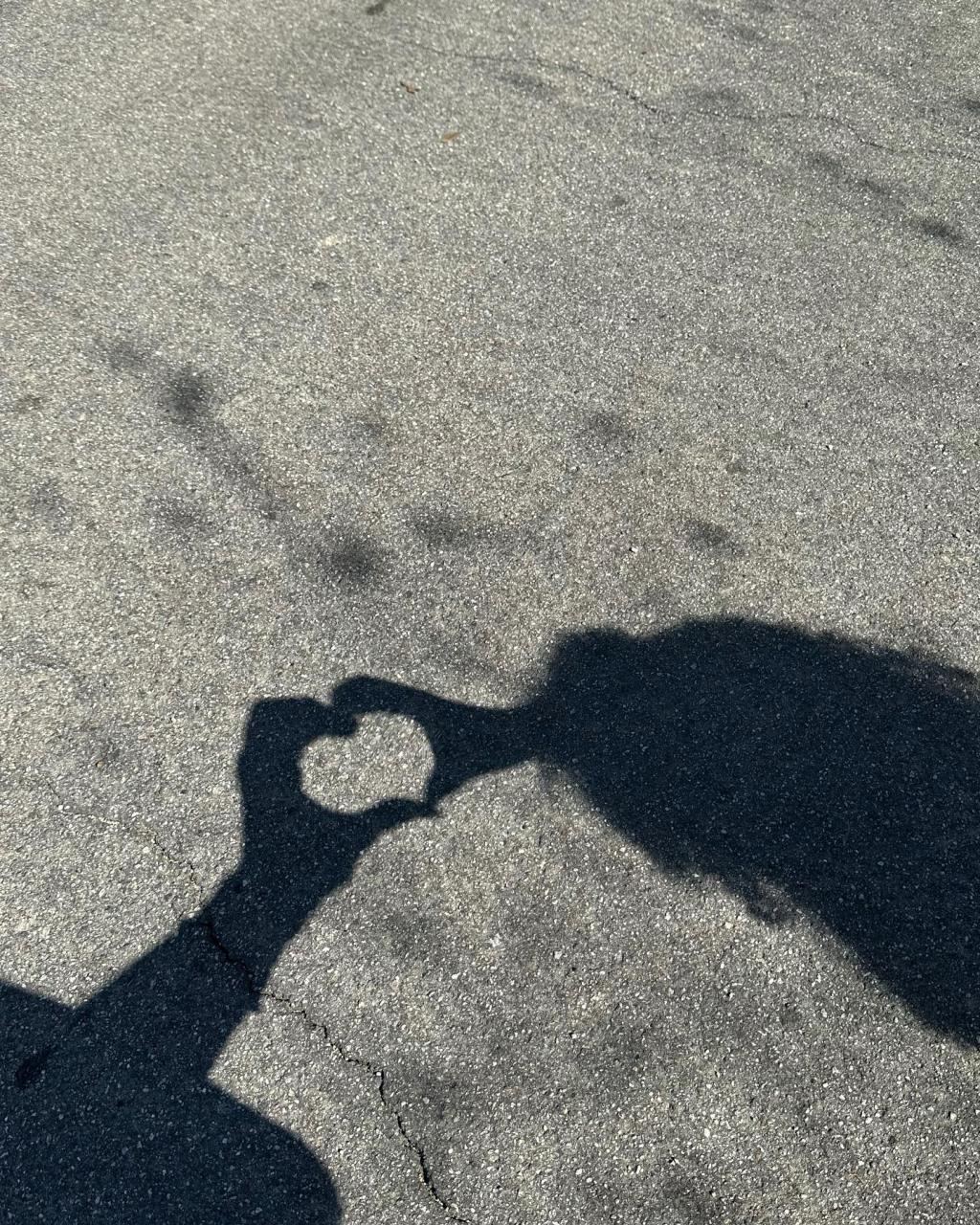 Kylie shared a cute snap of  Stormi and herself making a hand-heart-shaped shadow on the ground